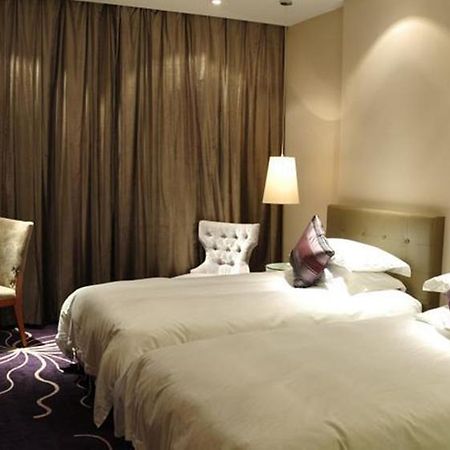 Budgetel Huadu Yiwu Hotel Room photo