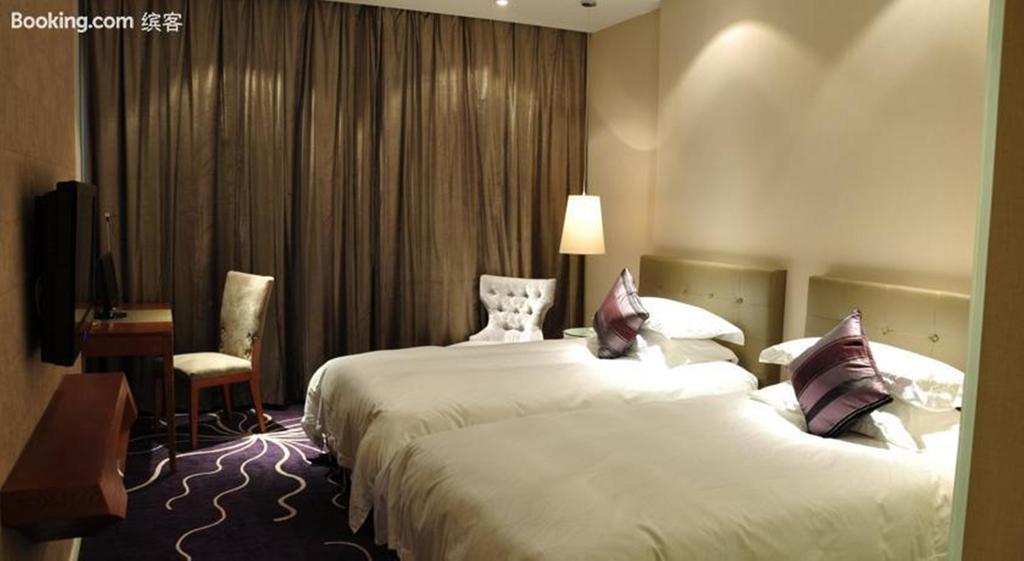 Budgetel Huadu Yiwu Hotel Room photo